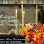 A thanksgiving card with candles and flowers.