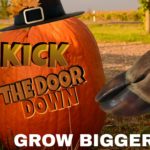A pumpkin with the words kick the door down and grow bigger
