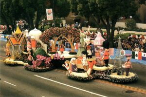 A parade float with many floats on it.