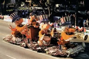 Birds playing instruments on festive float