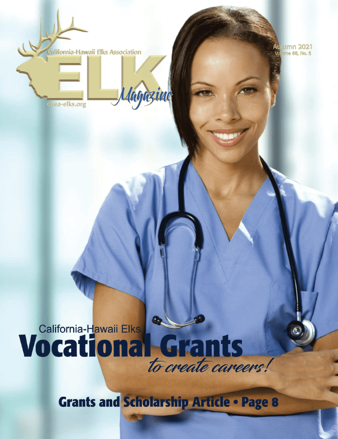 Smiling nurse in blue scrubs with stethoscope