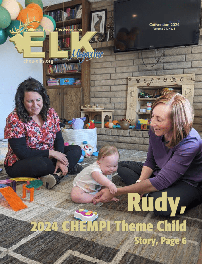 Women playing with baby on living room floor