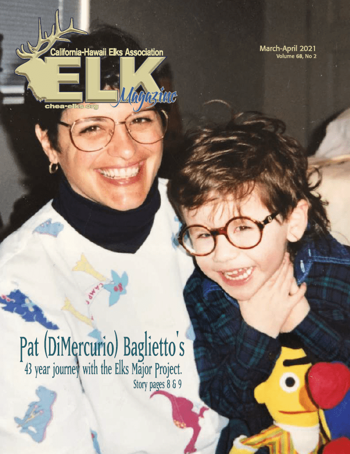 Smiling woman and child wearing glasses