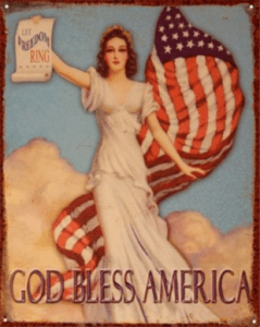 Woman holding flag with God Bless America text